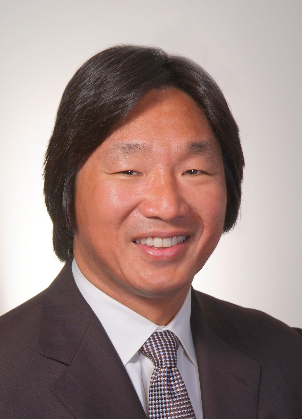 Portrait of Bing Liem smiling.